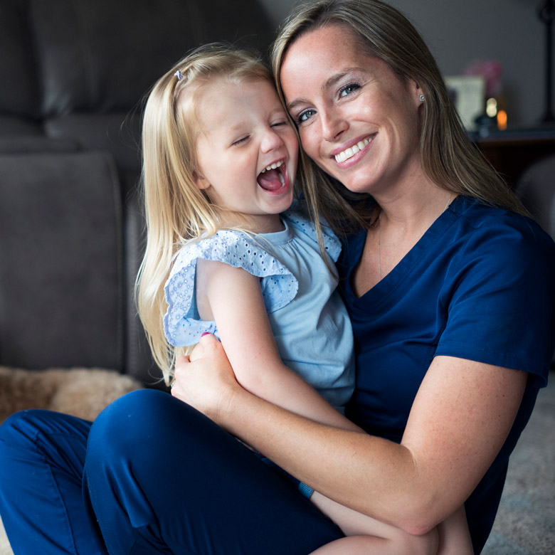 A nurse with her child.
